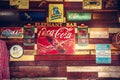 Koh Samui, Thailand Ã¢â¬â 30 june 2016: Vintage style old fashioned bar counter wooden wall with retro signs and signboards at cafe